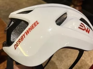 DerbyWheel CEO presents branded race helmet